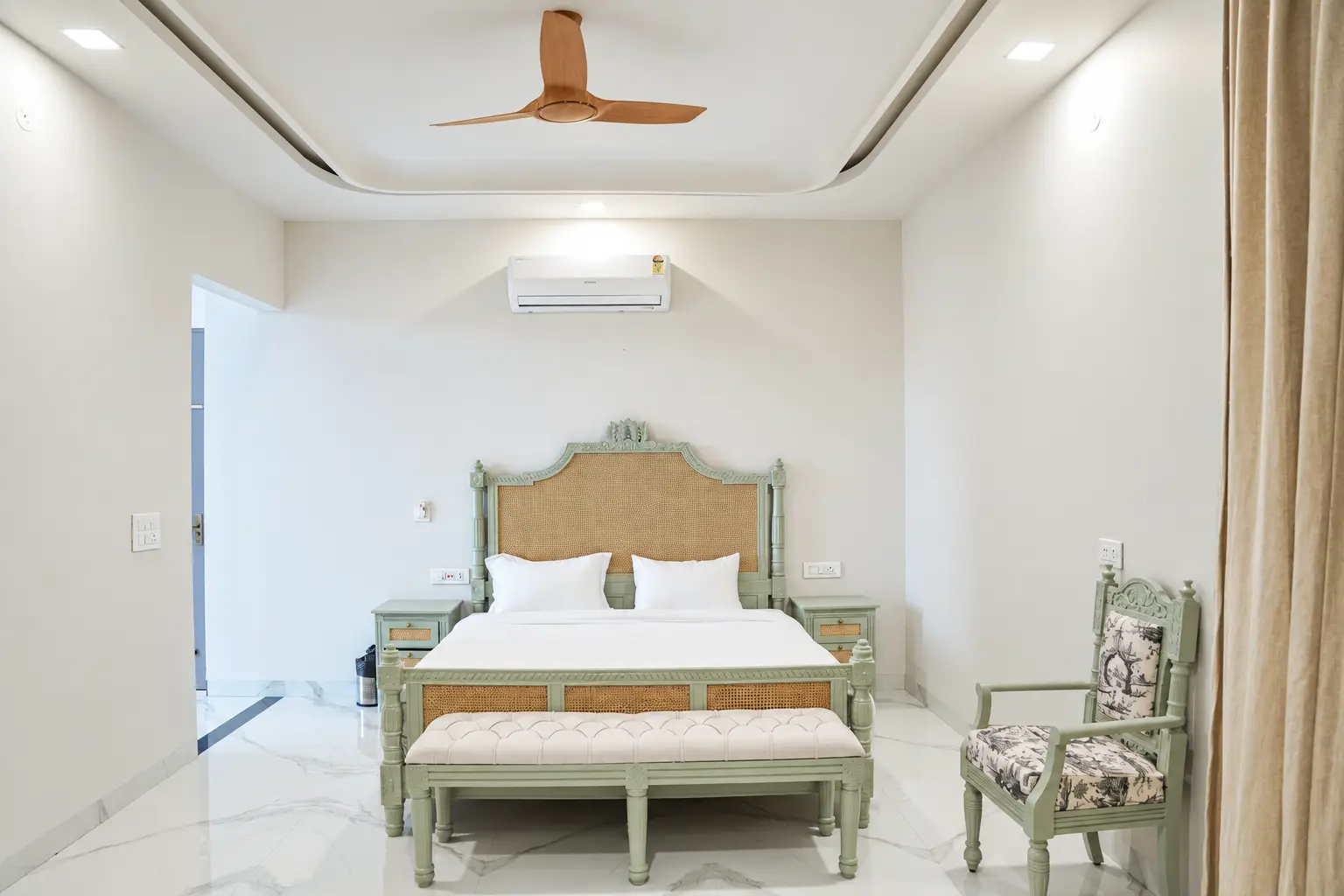 Bedroom with cane headboard